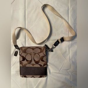 Coach brown small crossbody bag.